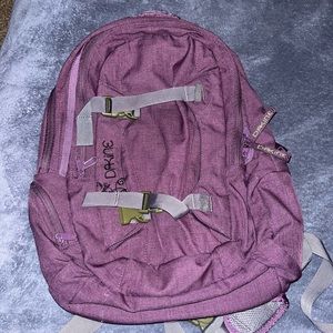 Purple Dakine snowboard skate backpack